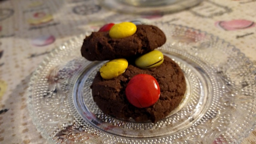 Two candy cookies on a small plate